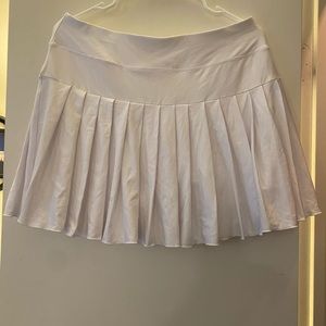 White women’s pleated tennis skirt. Size XL. Small inside pocket.
